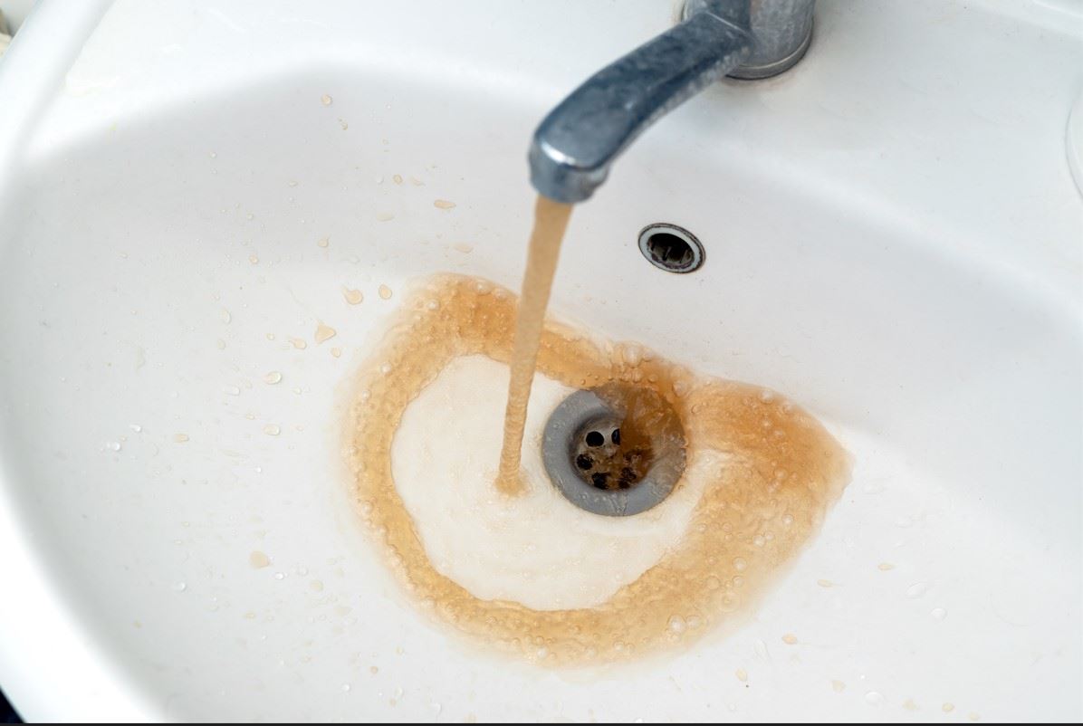 overflow in bathroom sink is rusty